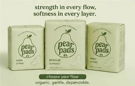 Natural feminine hygiene products displayed on wooden surface